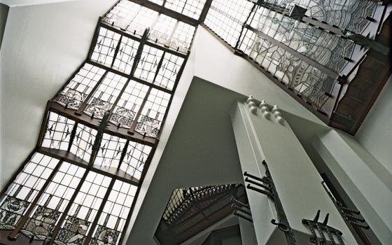 The monumental stairway of the Amrath hotel in the shippinghouse in Amsterdam