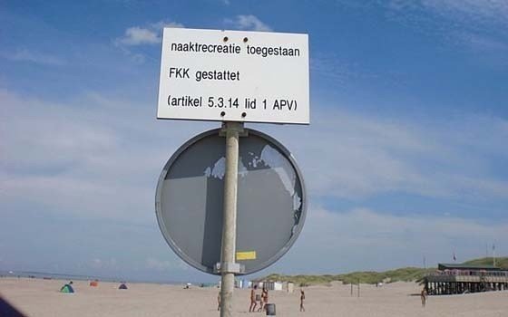 nudist beach sign