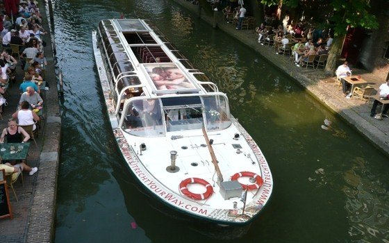 Canal bus through the canals of Utrecht