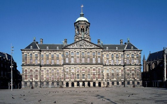 The main square of Amsterdam and the former city hall of Amsterdam now the royal palace