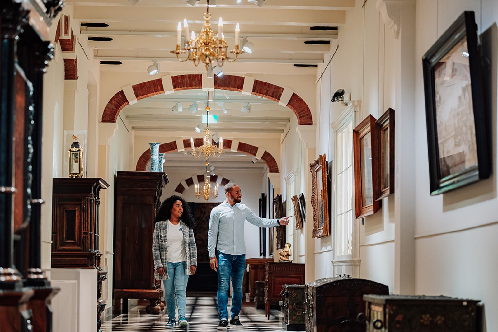 Teylers Museum Haarlem couple walking through corridor