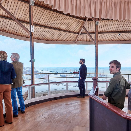 Visitors viewing Panorama Mesdag, H.W. Mesdag&rsquo;s 1881 panoramic painting of Scheveningen.