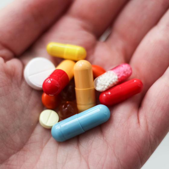 Colored medicine in hands
