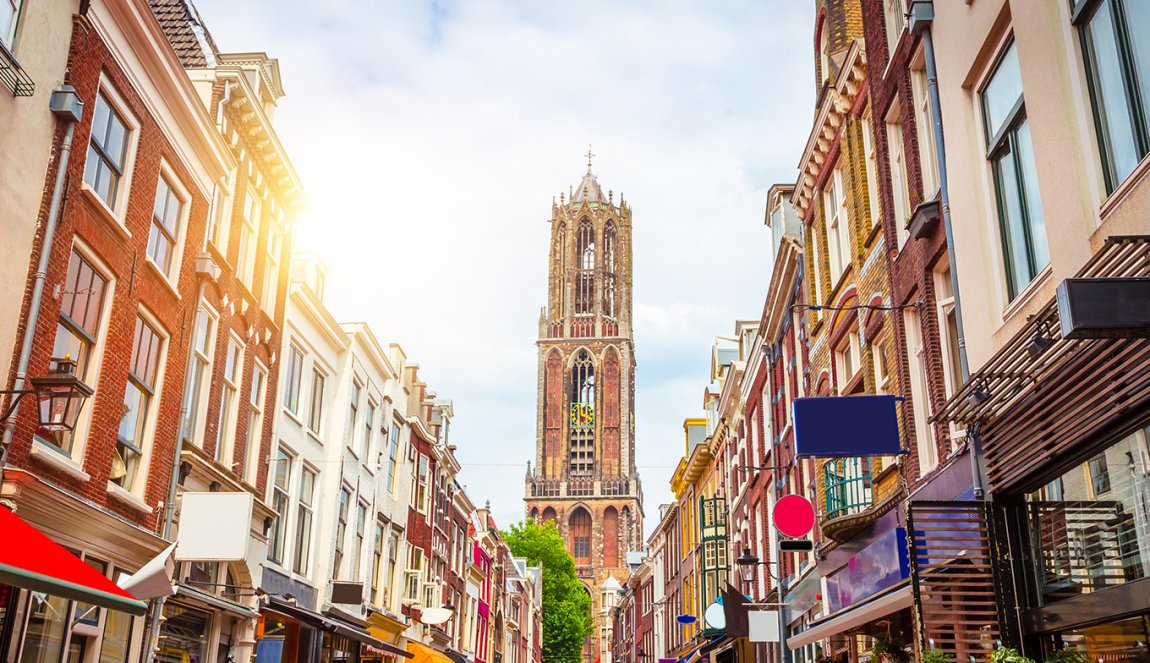 Traditional old buildings and tower of the Dom cathedral in Utrecht