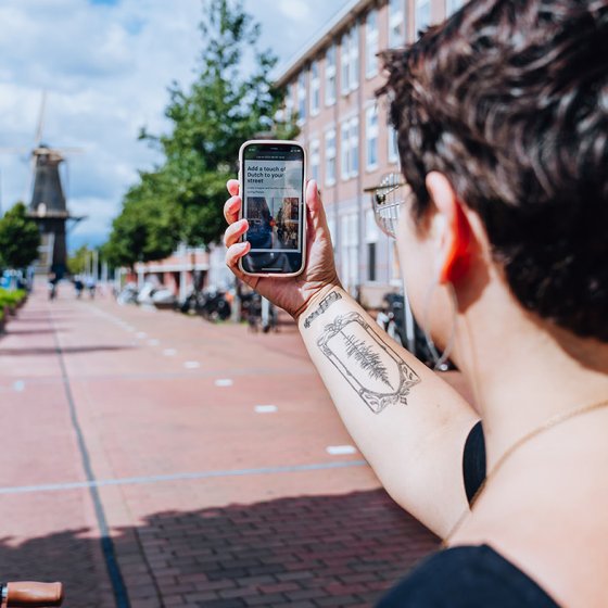 Melissa Bruntlett with mobile and Mill the Rose