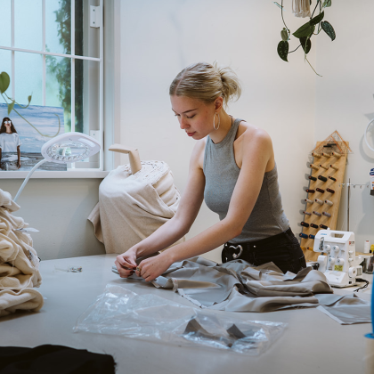 Girl works in atelier in Arnhem Modekwartier district Girl works in atelier in Arnhem Modekwartier district
