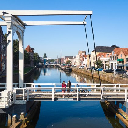 Hanseatic city of Zwolle ladies on Pelserbrug over Thorbeckegracht