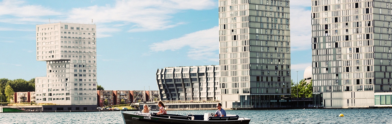 Boating in Almere surrounded by architectural gems