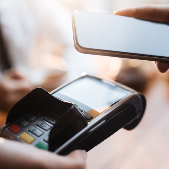 Paying with cell phone &copy; Pressmaster via Shutterstock