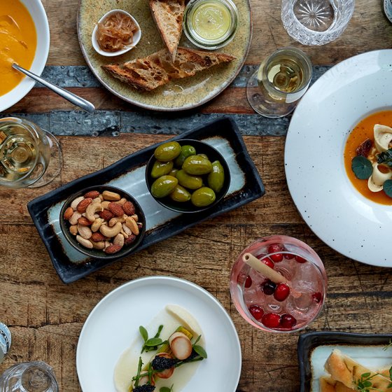 Table full of delicious dishes Meatless District Amsterdam