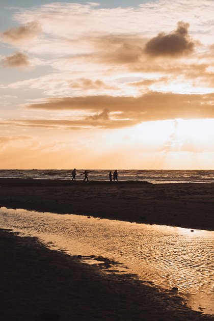 Wadden Islands sunset on the beach with people