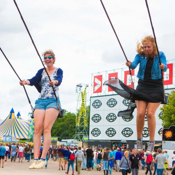 Two girls at Festival Lowlands on a swing