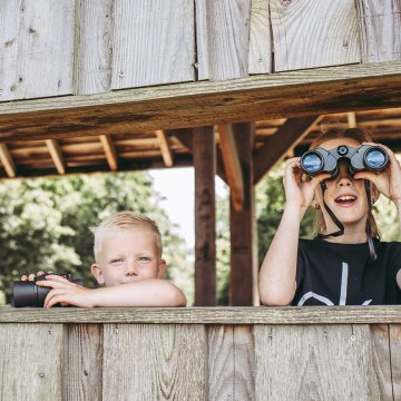 Children with binoculars in Kropswolderbuitenpolder Bird watching hut