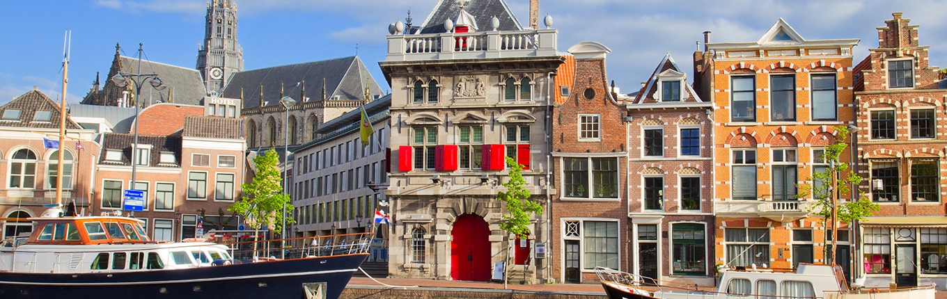 Canal with historical houses in old Haarlem Canal with historical houses in old Haarlem