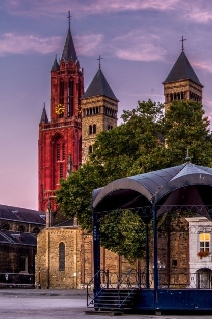 Vrijthof square in Maastricht with the red tower of Sint Janskerk and the Basilica of Saint Servatius