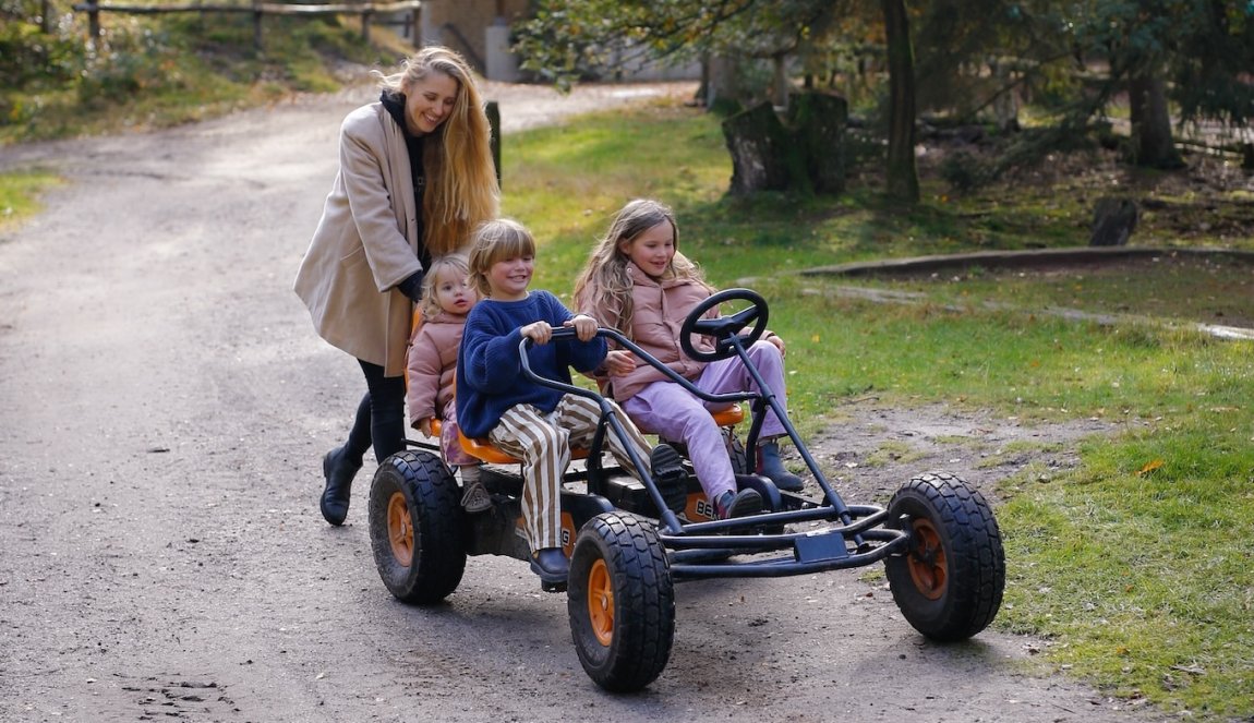 Elisabeth Van Lierop children on go-kart Elisabeth Van Lierop children on go-kart