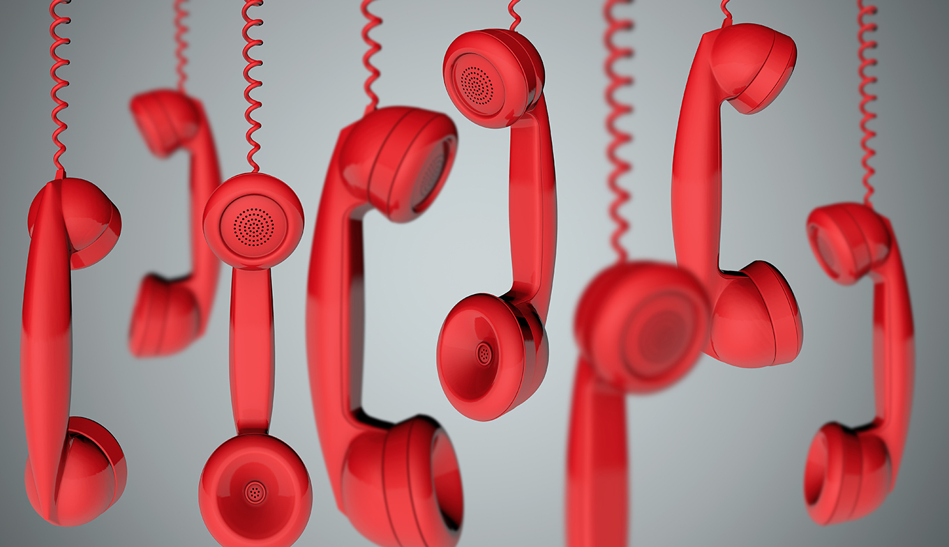 Red hanging telephone receivers Red hanging telephone receivers
