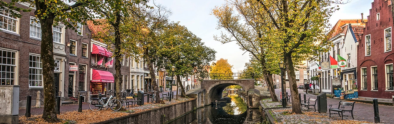 Edam view along canal towards Dam in autumn
