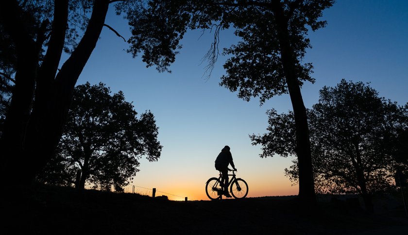 Cyclist with sunset