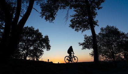 Cyclist with sunset