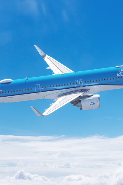 KLM Royal Dutch Airlines aircraft flying above the clouds