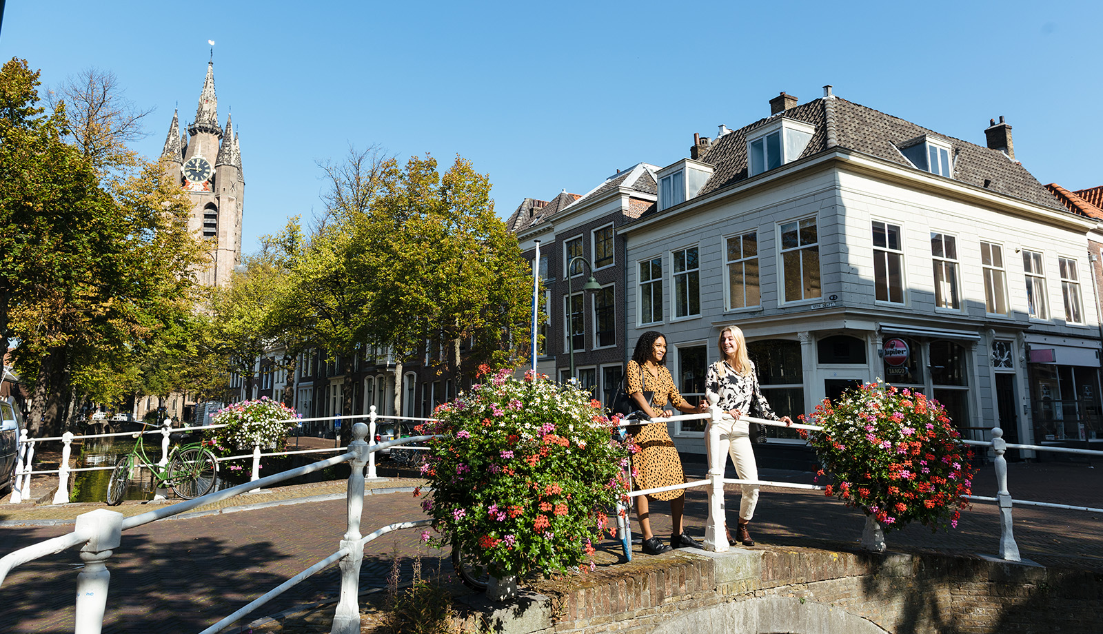 Ladies look out over Delft canal