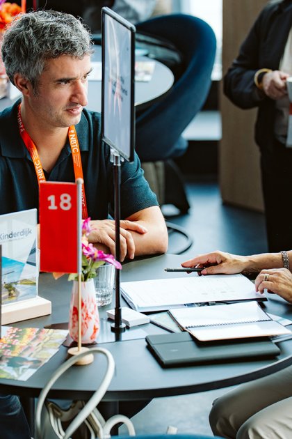 Tourism professionals discussing Dutch destinations during a one-to-one meeting at the Travel Trade Networking Event