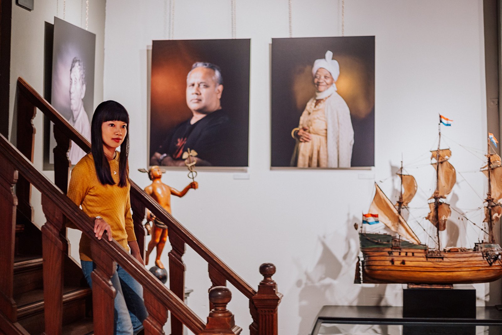 Westfries Museum lady comes down stairs