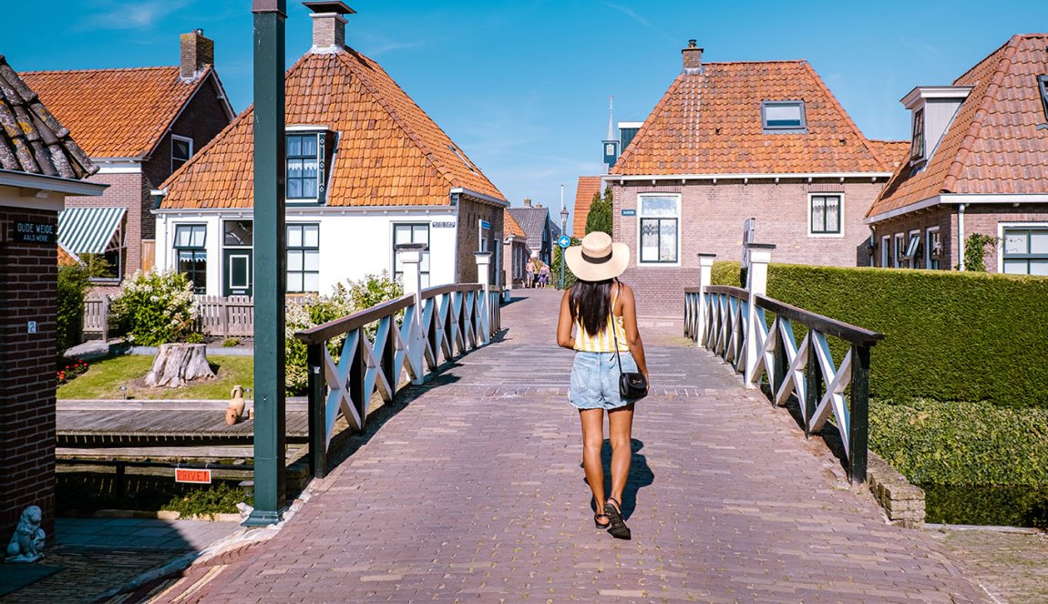 Girl on a small bridge in Hindeloopen Girl on a small bridge in Hindeloopen