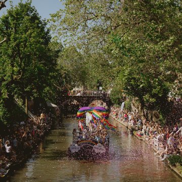 Utrecht Pride boat through canal with confetti