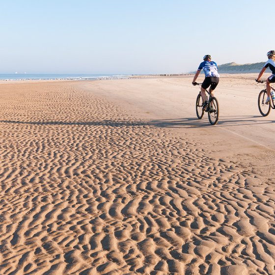 Cyclists on the beach between Schoorl and Bergen