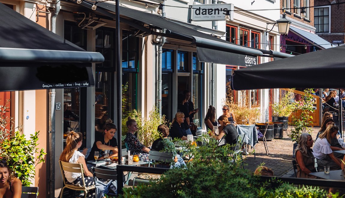 People sitting outside on the terrace Utrecht People sitting outside on the terrace Utrecht
