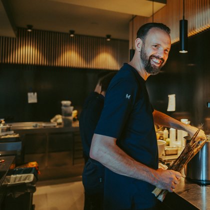 Emile De Nieuwe Winkel in his kitchen