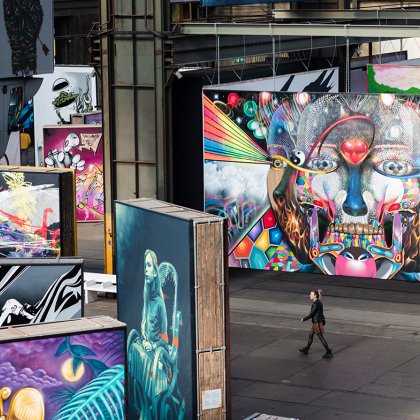 Woman walks through the STRAAT Museum at the NDSM site in Amsterdam