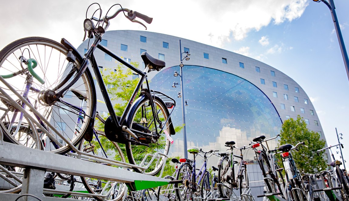 Bicycles parked in front of the Markthal, Rotterdam
