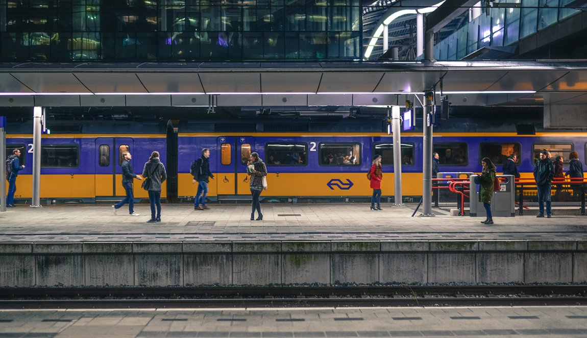 Utrecht central station, people waiting for train