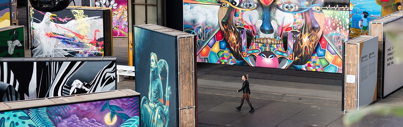 Woman walks through the STRAAT Museum at the NDSM site in Amsterdam