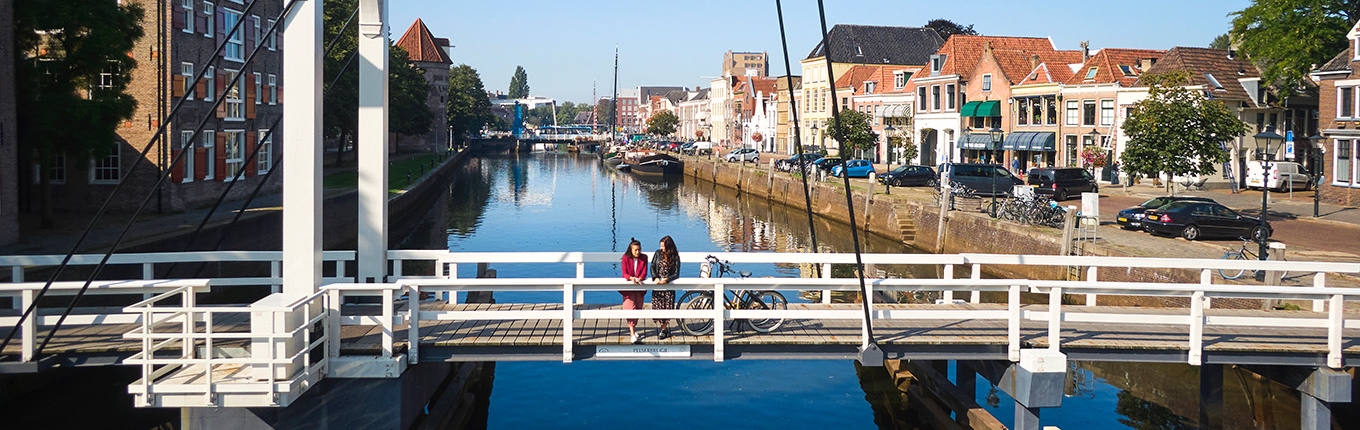 Hanseatic city of Zwolle ladies on Pelserbrug over Thorbeckegracht Hanseatic city of Zwolle ladies on Pelserbrug over Thorbeckegracht
