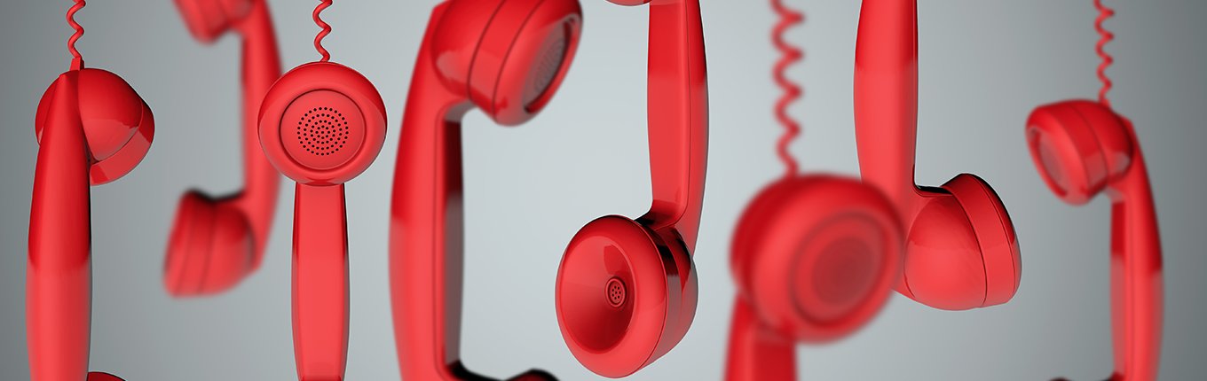 Red hanging telephone receivers Red hanging telephone receivers