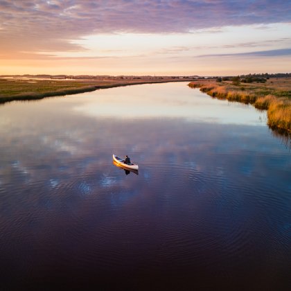Canoe at evening light in Lauwersmeer National Park