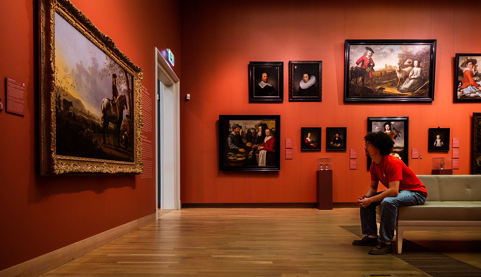 Visitor exploring Dutch art at the Dordrechts Museum