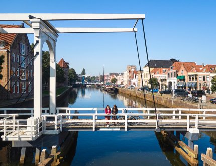 Hanseatic city of Zwolle ladies on Pelserbrug over Thorbeckegracht Hanseatic city of Zwolle ladies on Pelserbrug over Thorbeckegracht