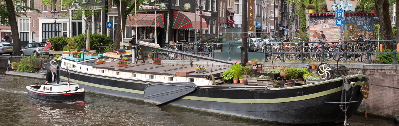 Houseboat museum on the canal Amsterdam Houseboat museum on the canal Amsterdam