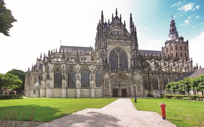 An exterior view of the St johns cathedral in the bosch An exterior view of the St johns cathedral in the bosch