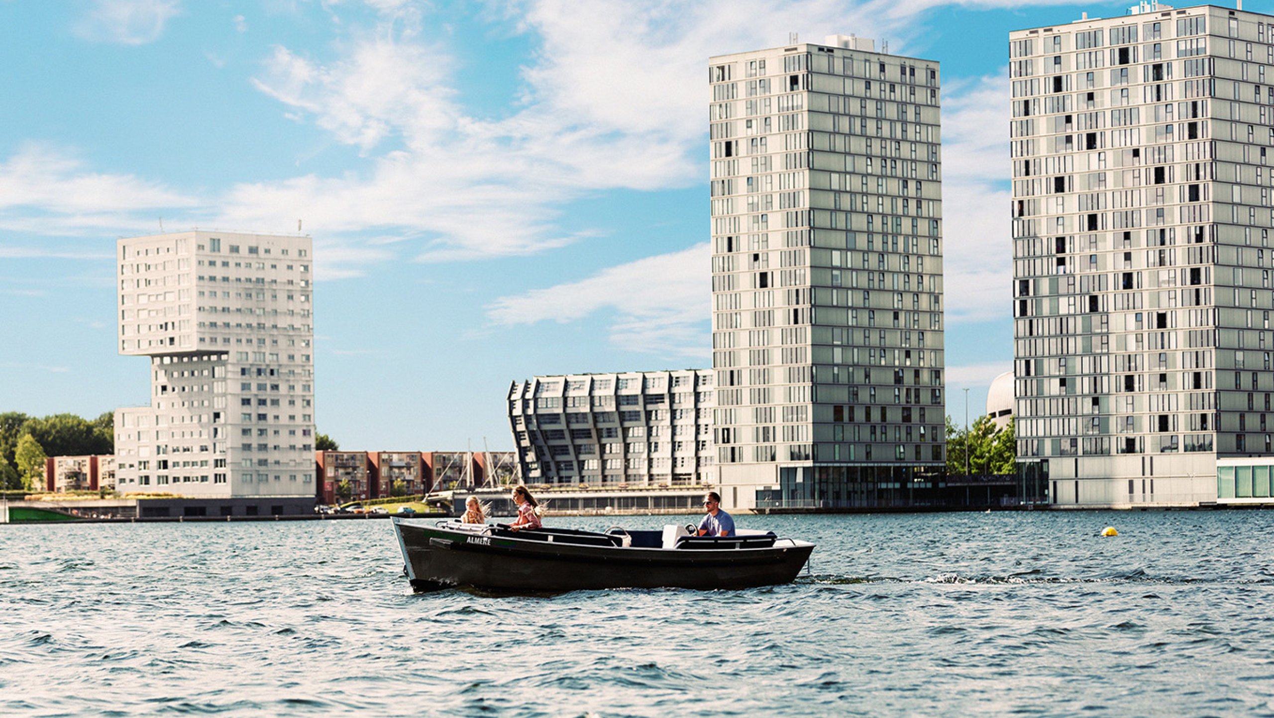 Boating in Almere surrounded by architectural gems