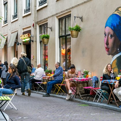 Mural of the Girl with the Pearl Earring by Johannes Vermeer on facade in Oude Molstraat The Hague
