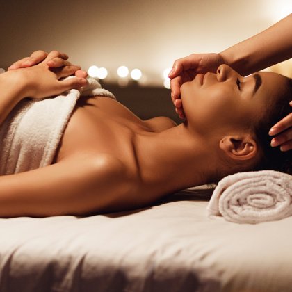 Face massage woman getting spa treatment