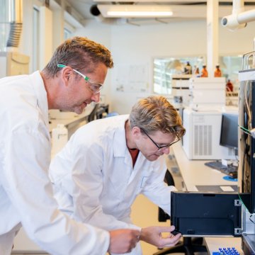 Watertechnology experts doing research in the Wetsus research lab