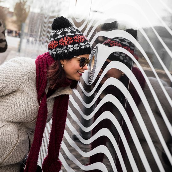 Woman looks through peephole Depot Boijmans Van Beuningen Rotterdam
