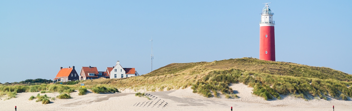 Texel beach with lighthouse Texel beach with lighthouse